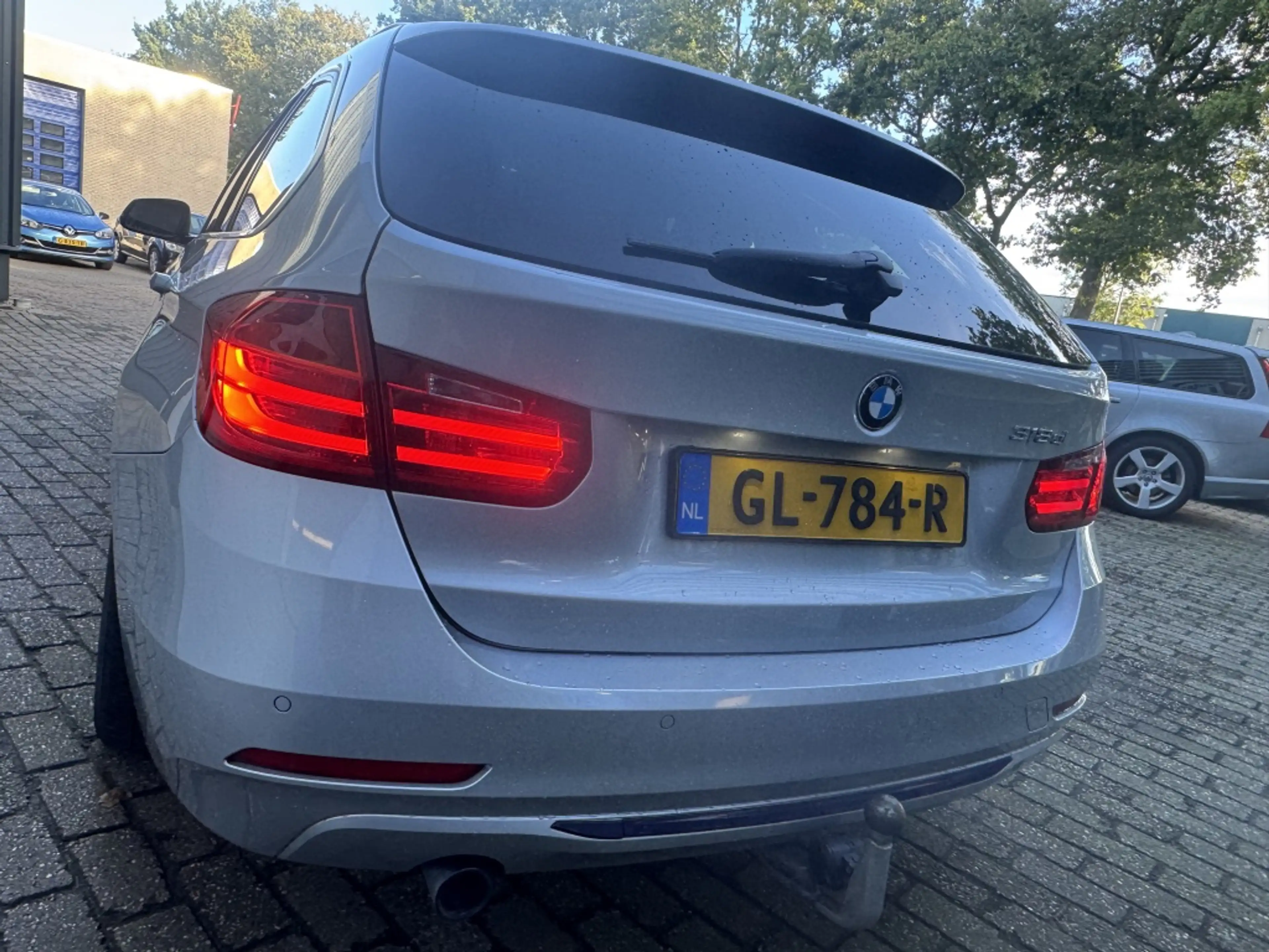 BMW 318 3-serie Touring 318d Executive — photo 11
