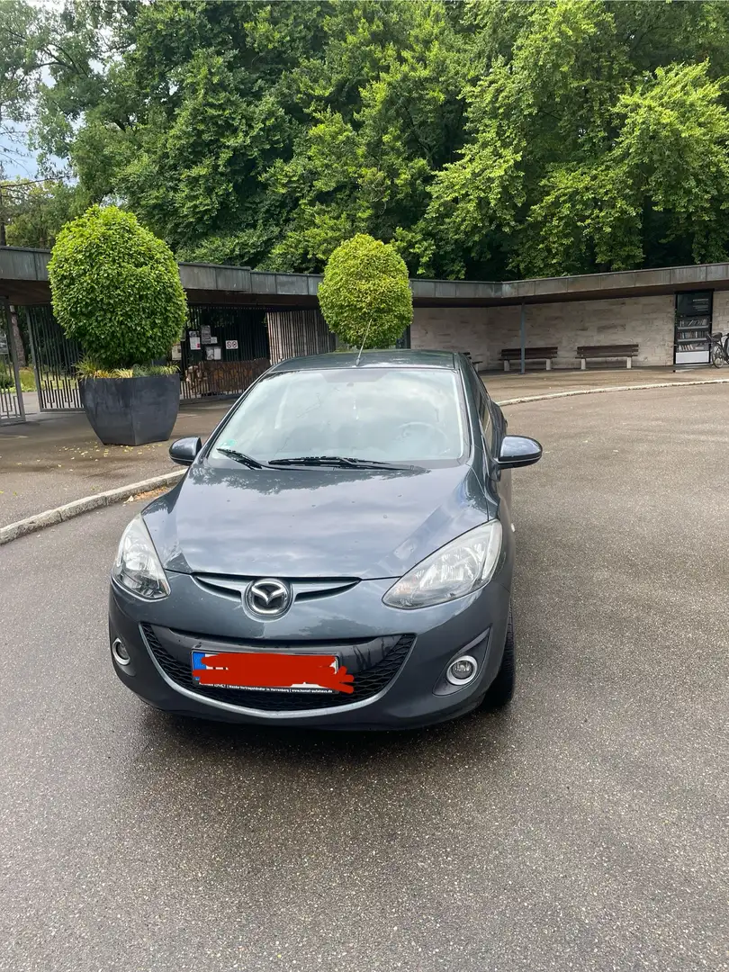 Mazda 2 mit sommer-/ winterreifen und Alufelgen felgen - 1