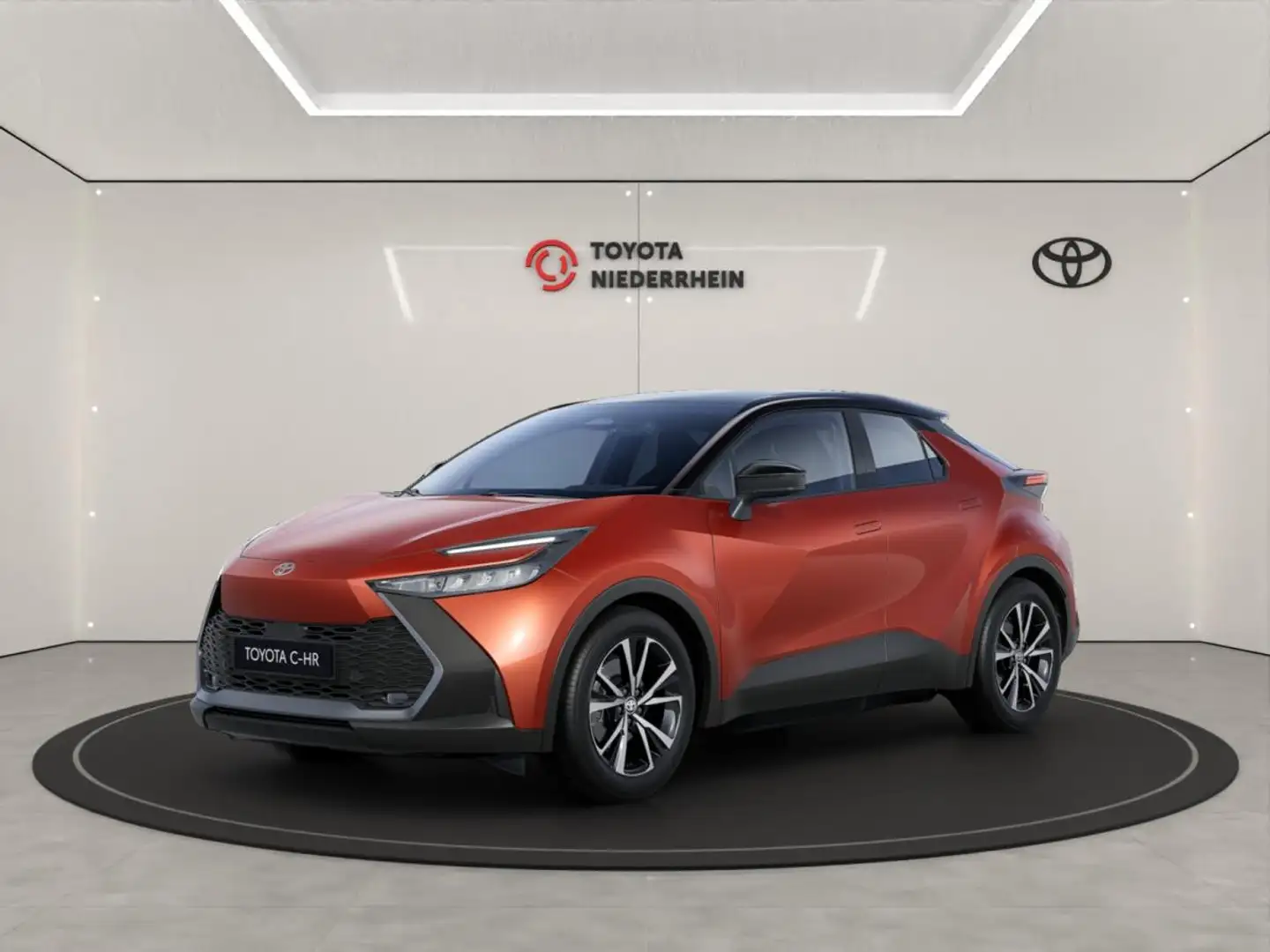 Toyota C-HR 🔌 2.0-l-VVT-i Plug-in Hybrid Teamplayer + Technik Orange - 1