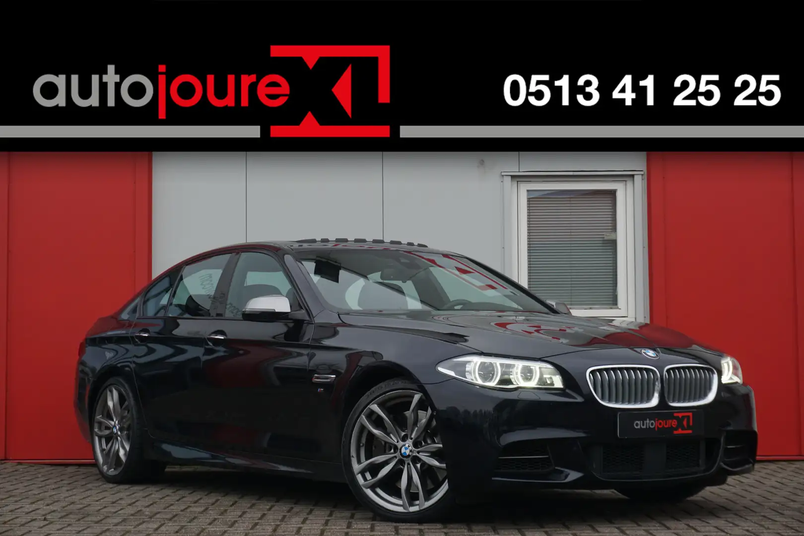 BMW M550 5-serie M550xd | HUD | ACC | Panorama | Softclose Black - 1