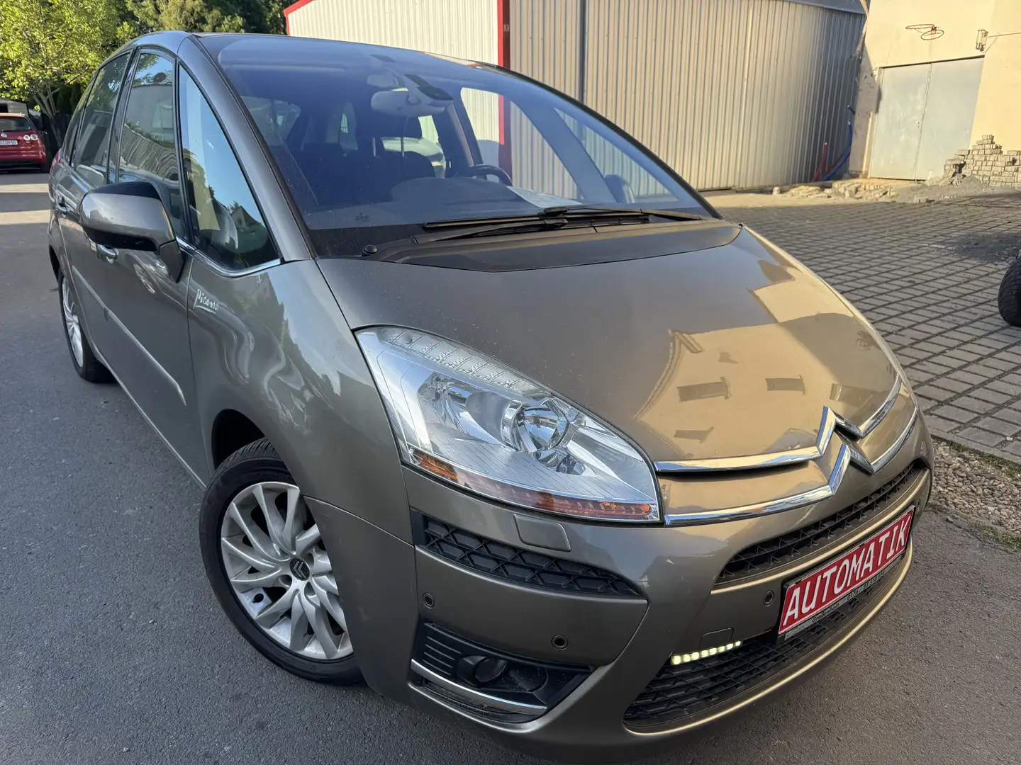Citroen C4 Picasso Exclusive/Automatik/Temp./SHZ/Klima/PDC/Alu/Isofix Bruin - 1