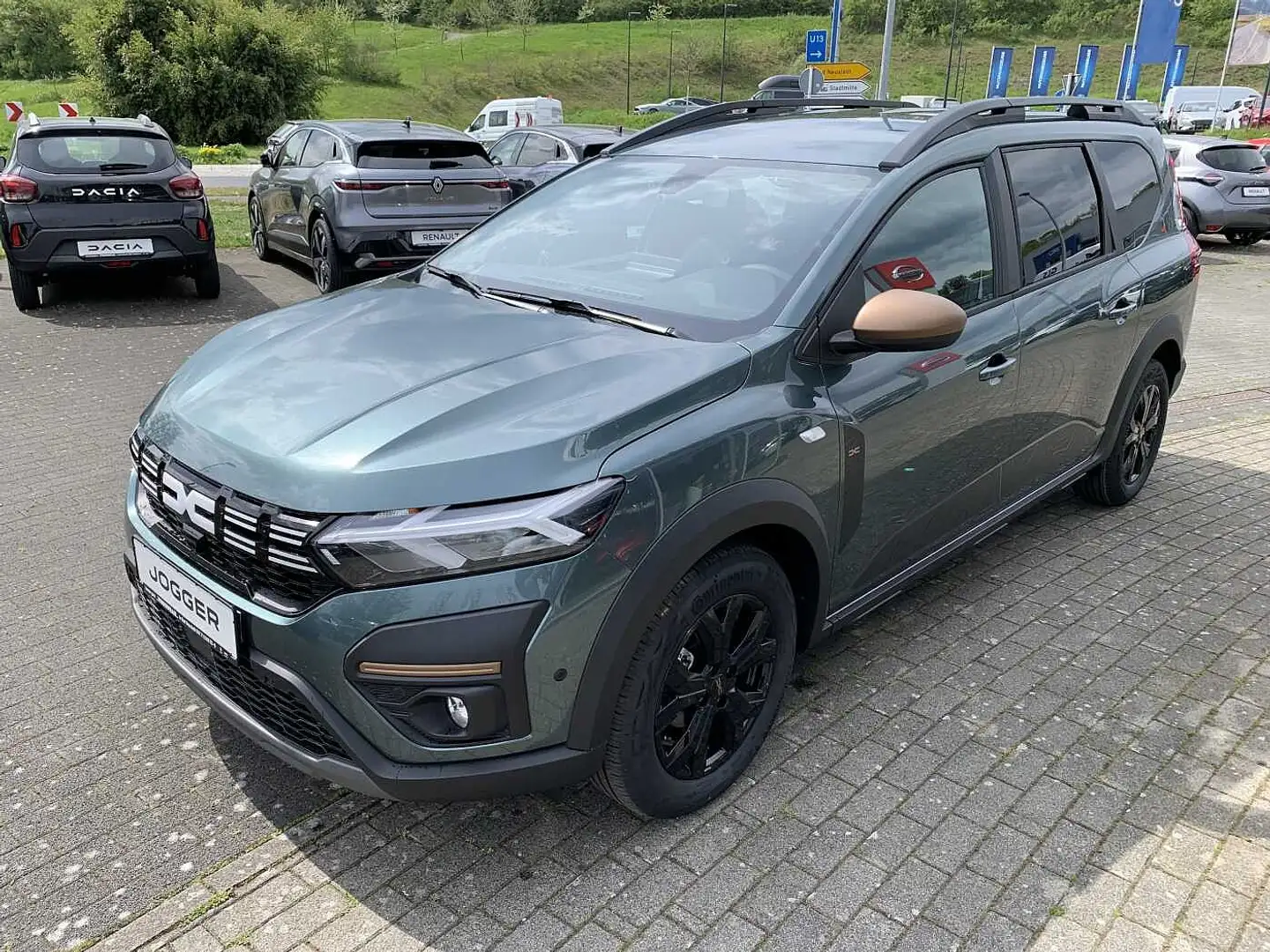 Dacia Jogger Hybrid140 Extreme Navi PDC vo+hi+Kamera SHZ Grün - 1