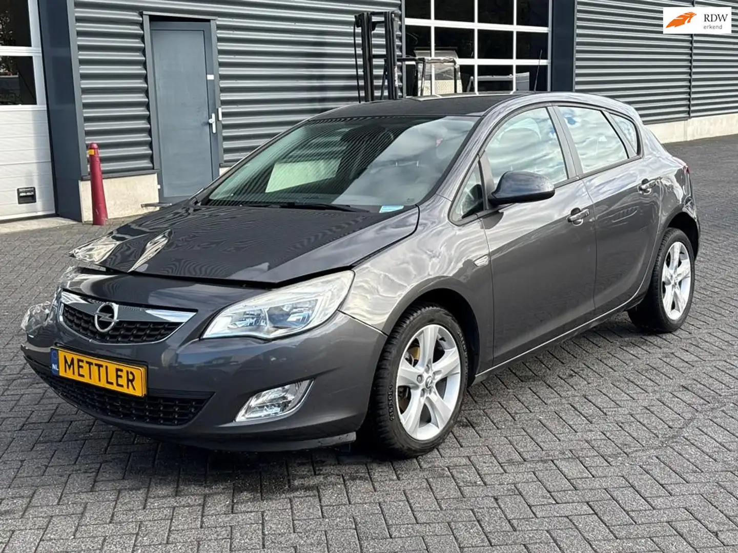 Opel Astra 1.4 Turbo Edition, airco, cruise control Grijs - 1