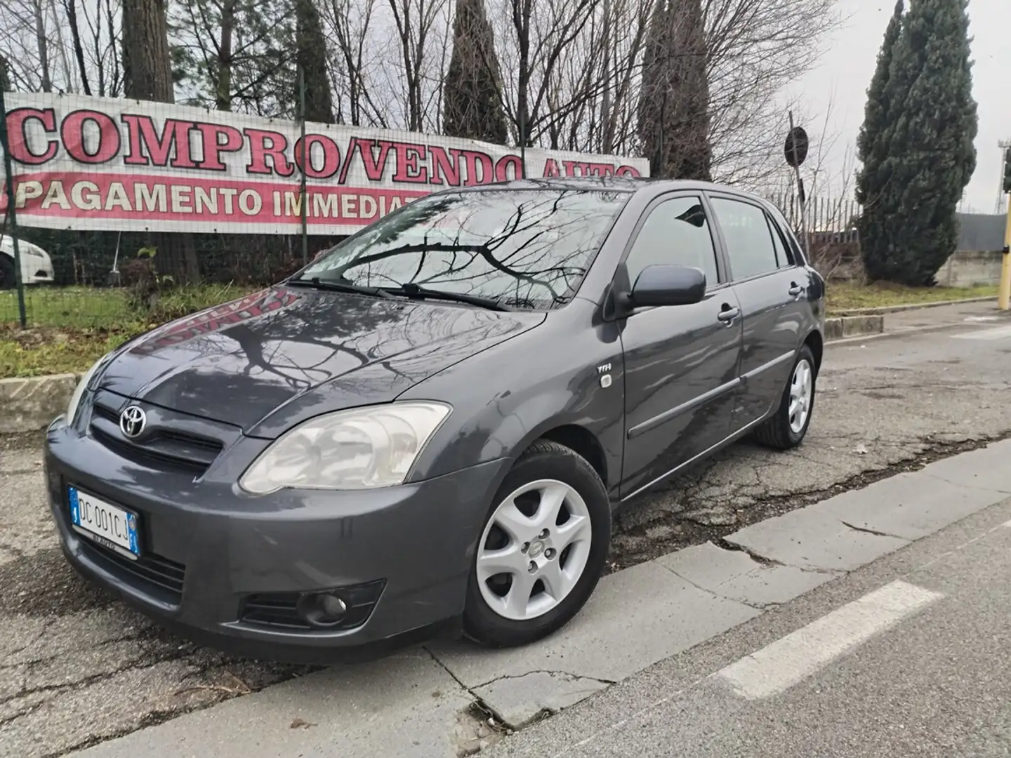 Toyota Corolla 1.4 16V 5 porte Sol ESP Bronzová - 1