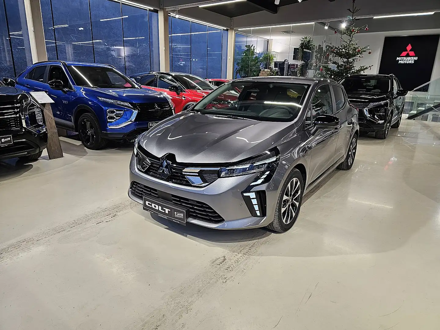 Mitsubishi Colt 1,6 HEV YUKI Invite S+C AT 25 Grau - 1