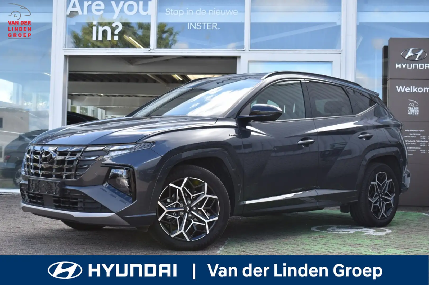 Hyundai TUCSON 1.6 T-GDI HEV N-Line 230PK! "RIJKLAARPRIJS" Grijs - 1