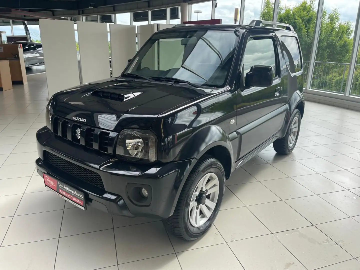 Suzuki Jimny 1.3 Style Leder/Klima/AHK/Alu/uvm. Nero - 1