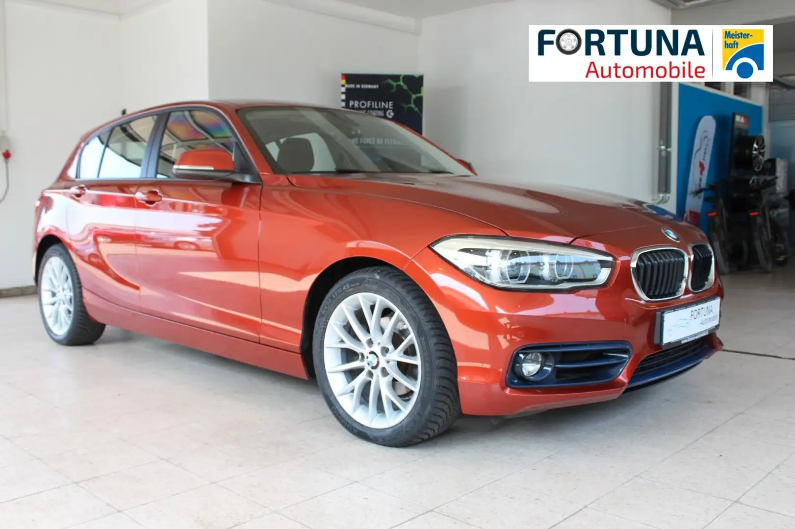 BMW 118 i Sport Line Navi LED AHK abnehmbar RTTI Orange - 1