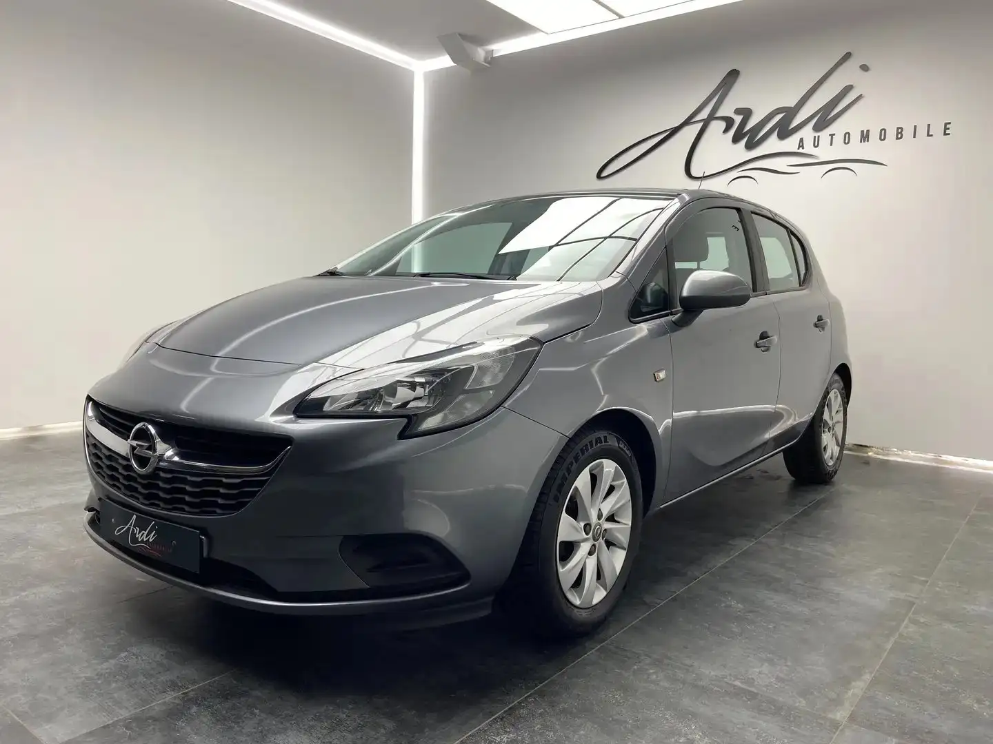 Opel Corsa 1.2i *GARANTIE 12 MOIS*BLUETOOTH*AIRCO* Grijs - 1