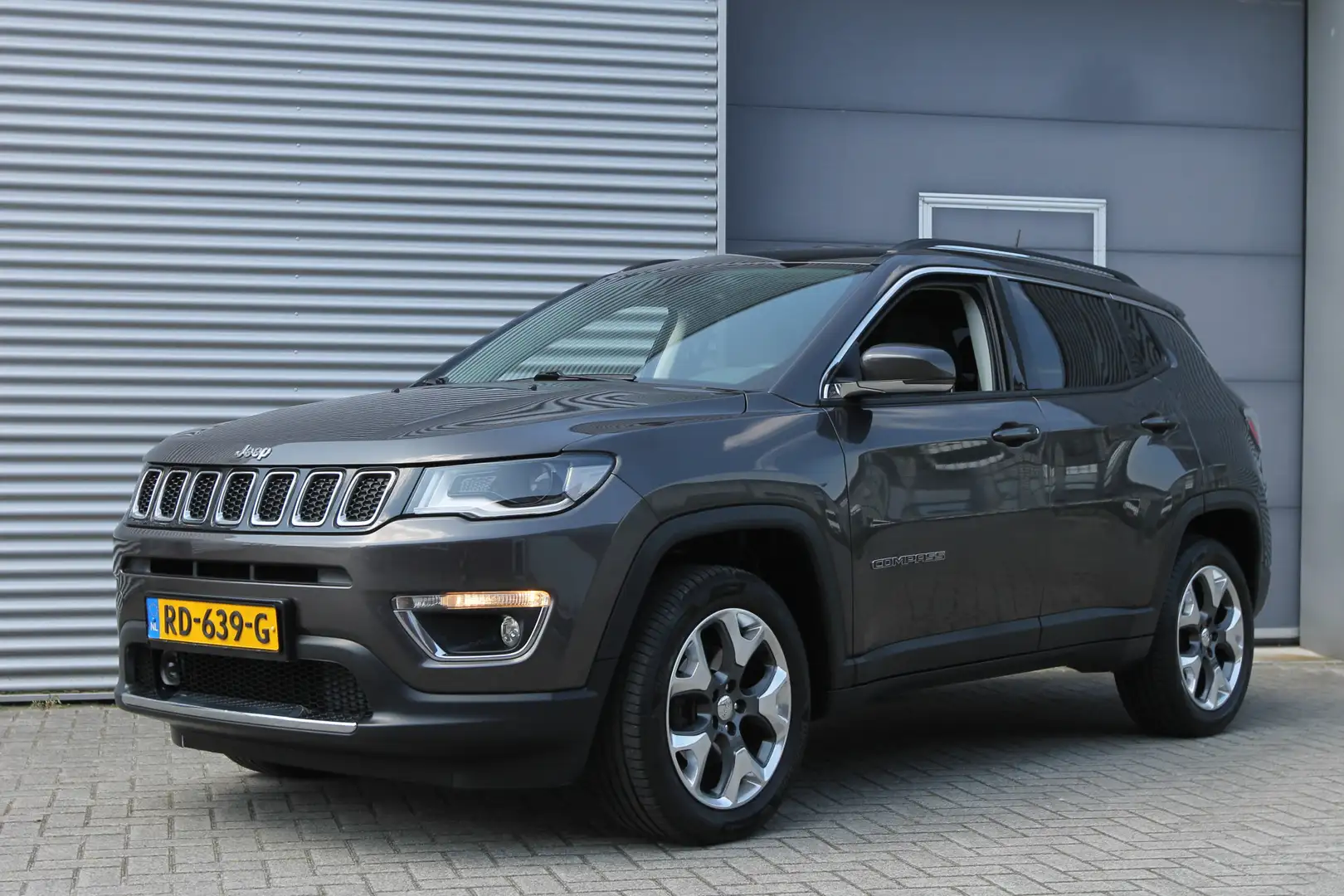 Jeep Compass 1.4 MultiAir Limited 4x4 I Automaat I Navi I 1/2 L Grijs - 1