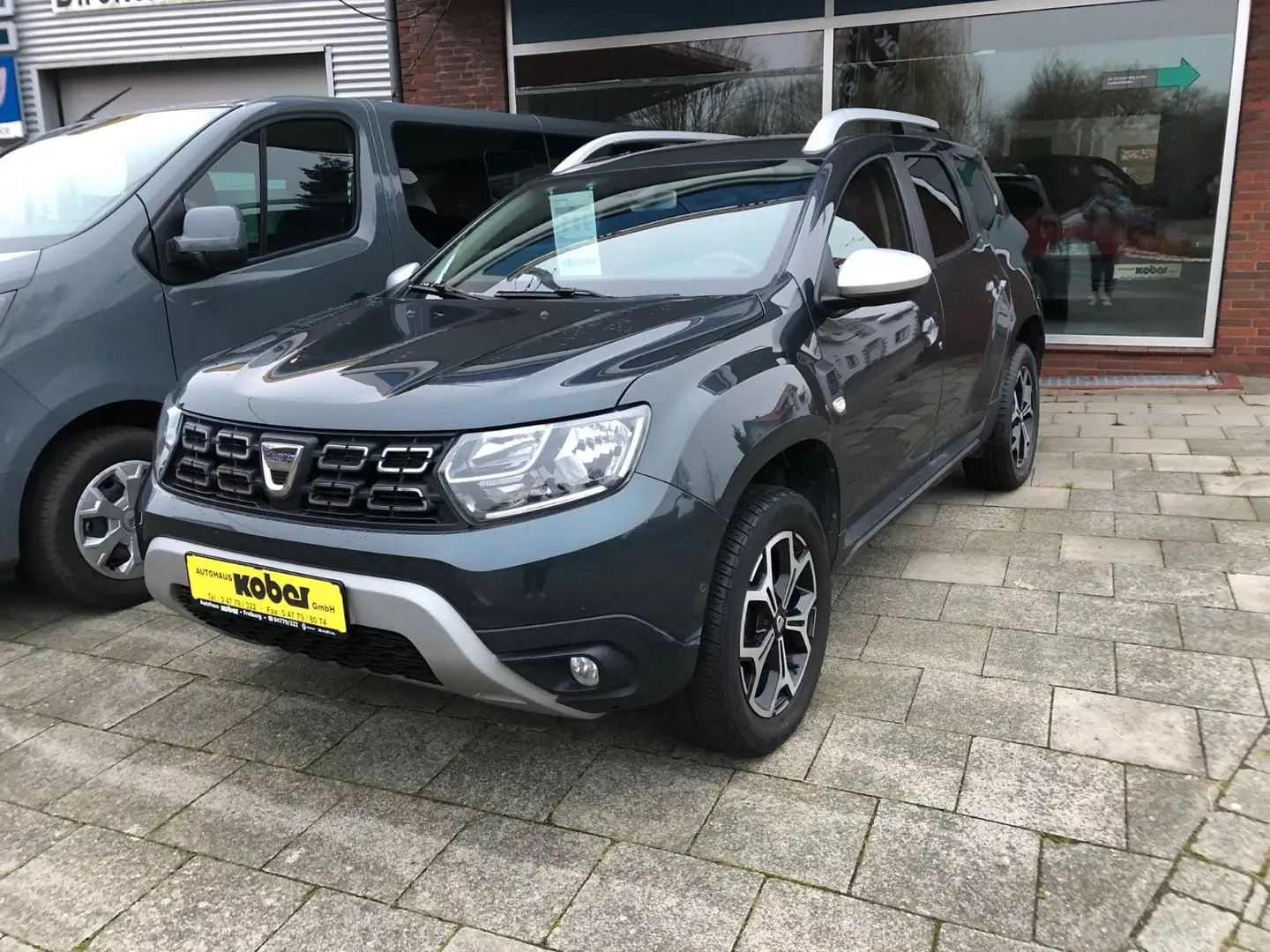 Dacia Duster II Prestige 8 fach bereift Gris - 1