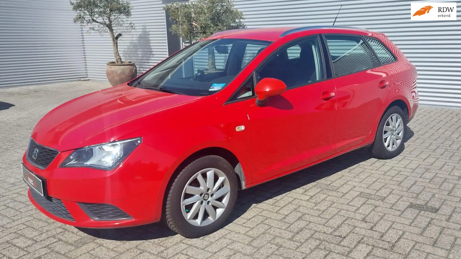 SEAT Ibiza ST 1.4 Reference navigatie, lichtmetalen velgen, s Rouge - 1