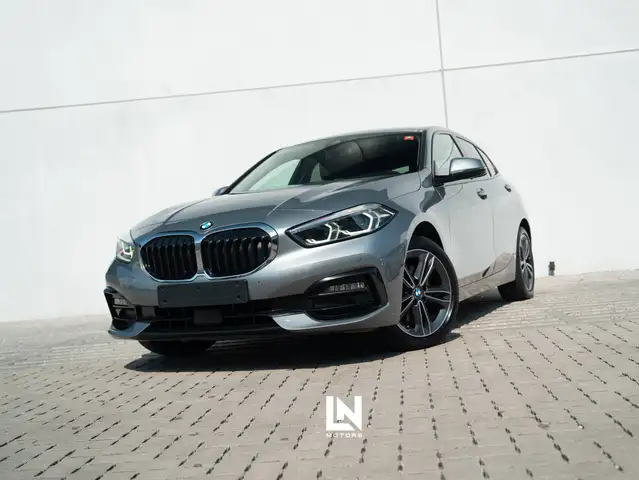 BMW 118 Sport Line | 1J GARANTIE | Pano dak | Zetelverwarming | Apple Carplay | Parkeersensoren | Cruise control ...