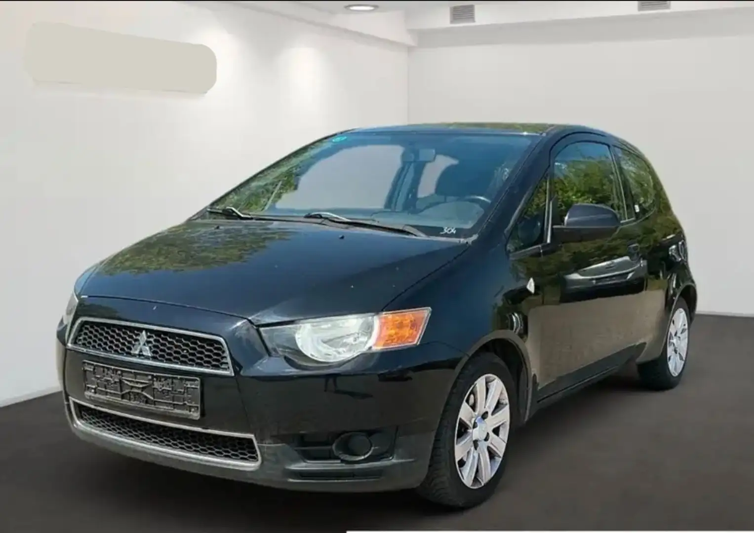 Mitsubishi Colt 1.1i - Airco + Keuring/ Garantie - Parkingsensoren Zwart - 1