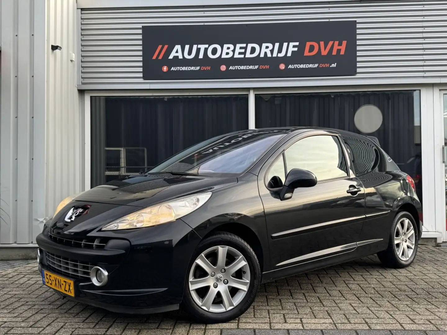Peugeot 207 1.6 VTi | PANO | CRUISE | AIRCO | PARKEERSENS. | Zwart - 1