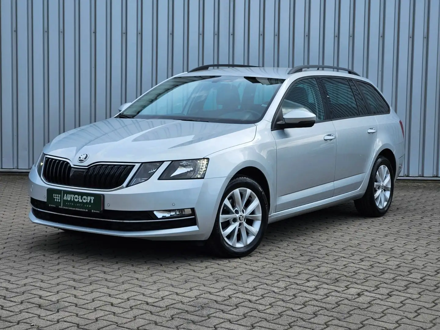 Skoda Octavia Combi Style 1.6 TDI DSG STANDH.|NAVI|SHZ Zilver - 1