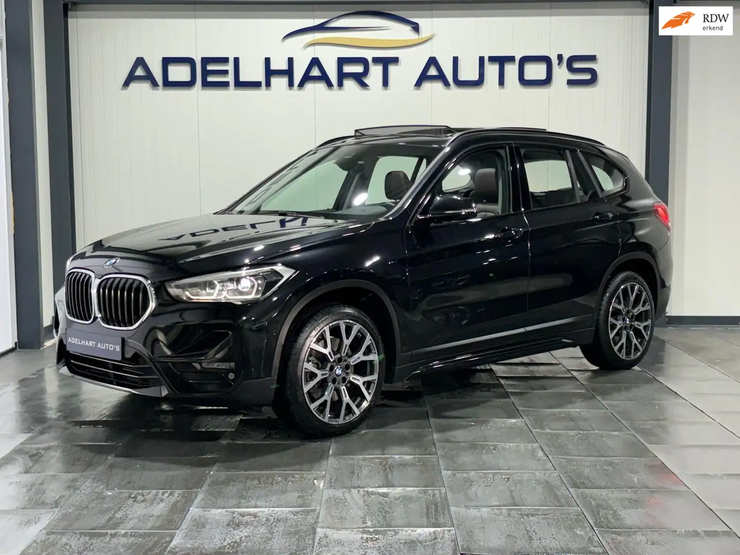 BMW X1 XDrive20i High Executive Automaat / Panorama dak / Noir - 1