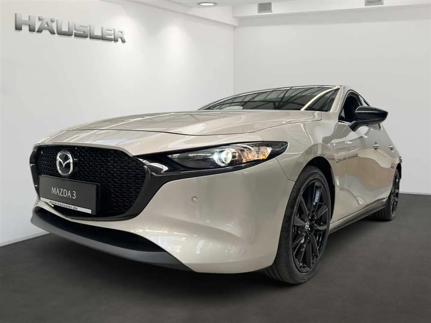 Mazda 3 Homura G-140 AT mit Kamera, Head-Up Disp. & LED Goud - 1