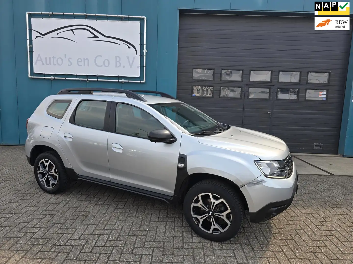 Dacia Duster 1.6 SCe Comfort 2019 Clima Cruise Navigatie 17"Lm Grigio - 1