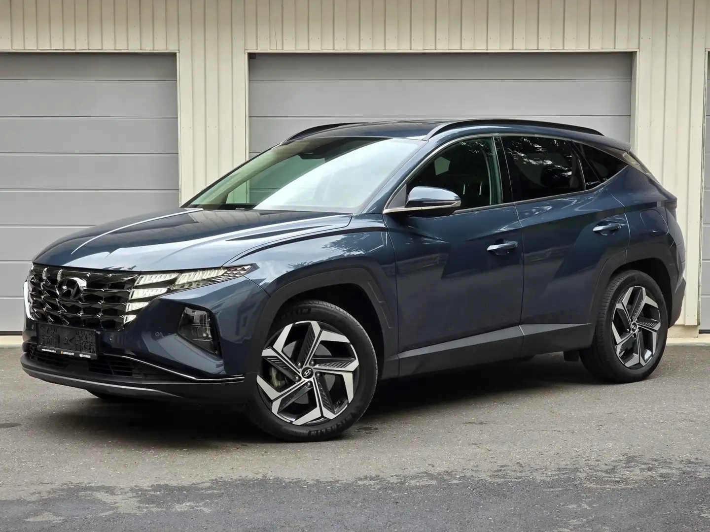 Hyundai TUCSON 1,6 T-GDI Hybrid Pure 4WD ALLRAD AHK Blau - 1