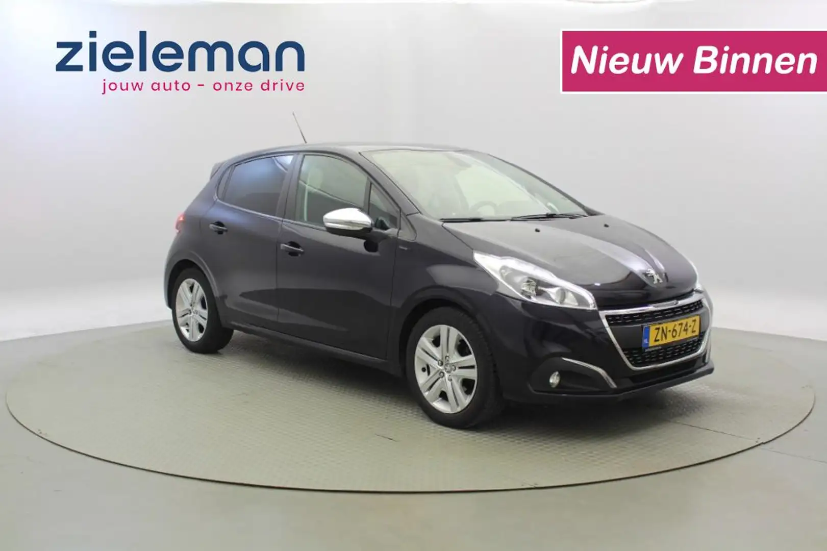 Peugeot 208 1.2 PureTech Signature - Carplay, Cruise, Airco Blauw - 1