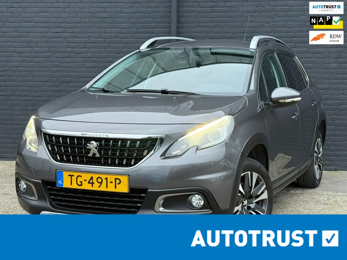 Peugeot 2008 1.2 PureTech Allure NAVI|CAMERA|PDC|CRUISE|TREKHAA Grijs - 1