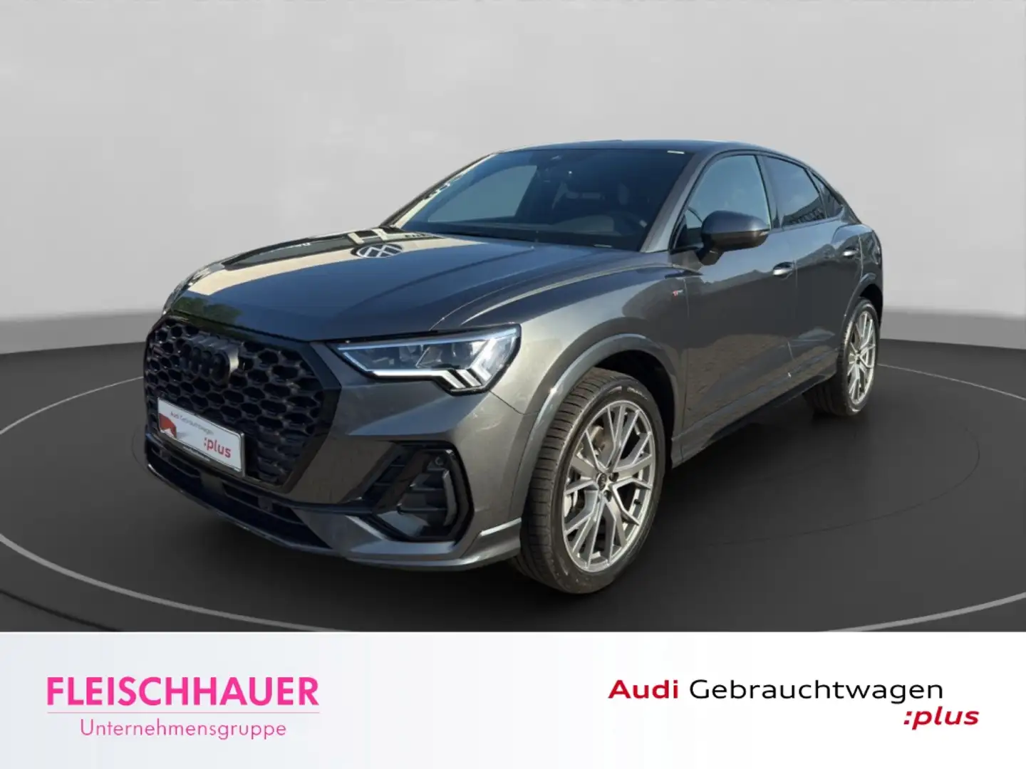 Audi Q3 Sportback quattro S line 40 TFSI LED+AHK+NAVI+CARP Grijs - 1