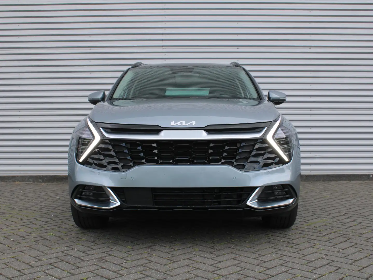 Kia Sportage 1.6 T-GDi Hybrid DynamicPlusLine | Automaat | Nieu Grijs - 2