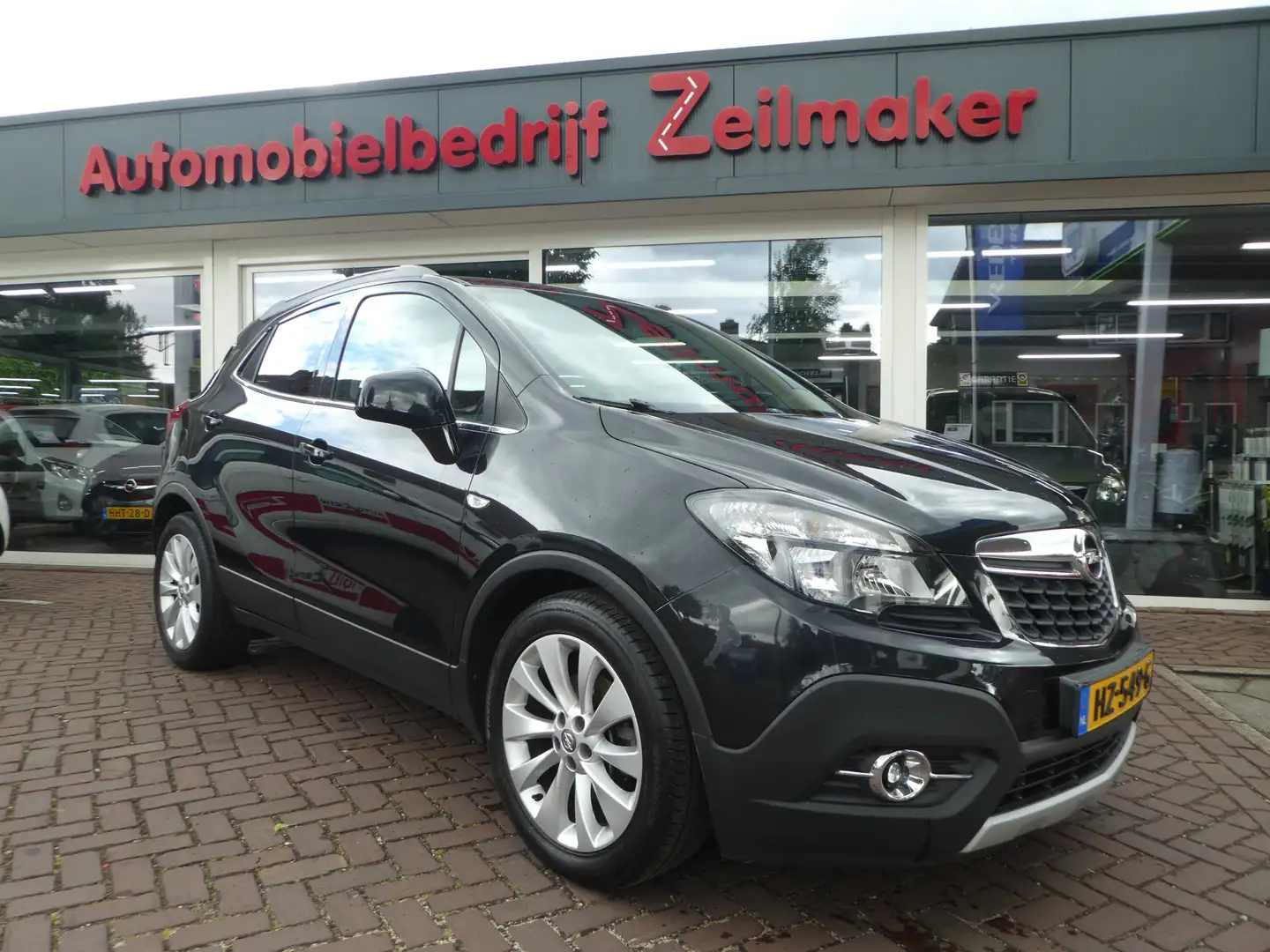 Opel Mokka 1.4 T Cosmo Clima, Navi, 18"LM, Trekhaak,  PDC V+A Zwart - 1