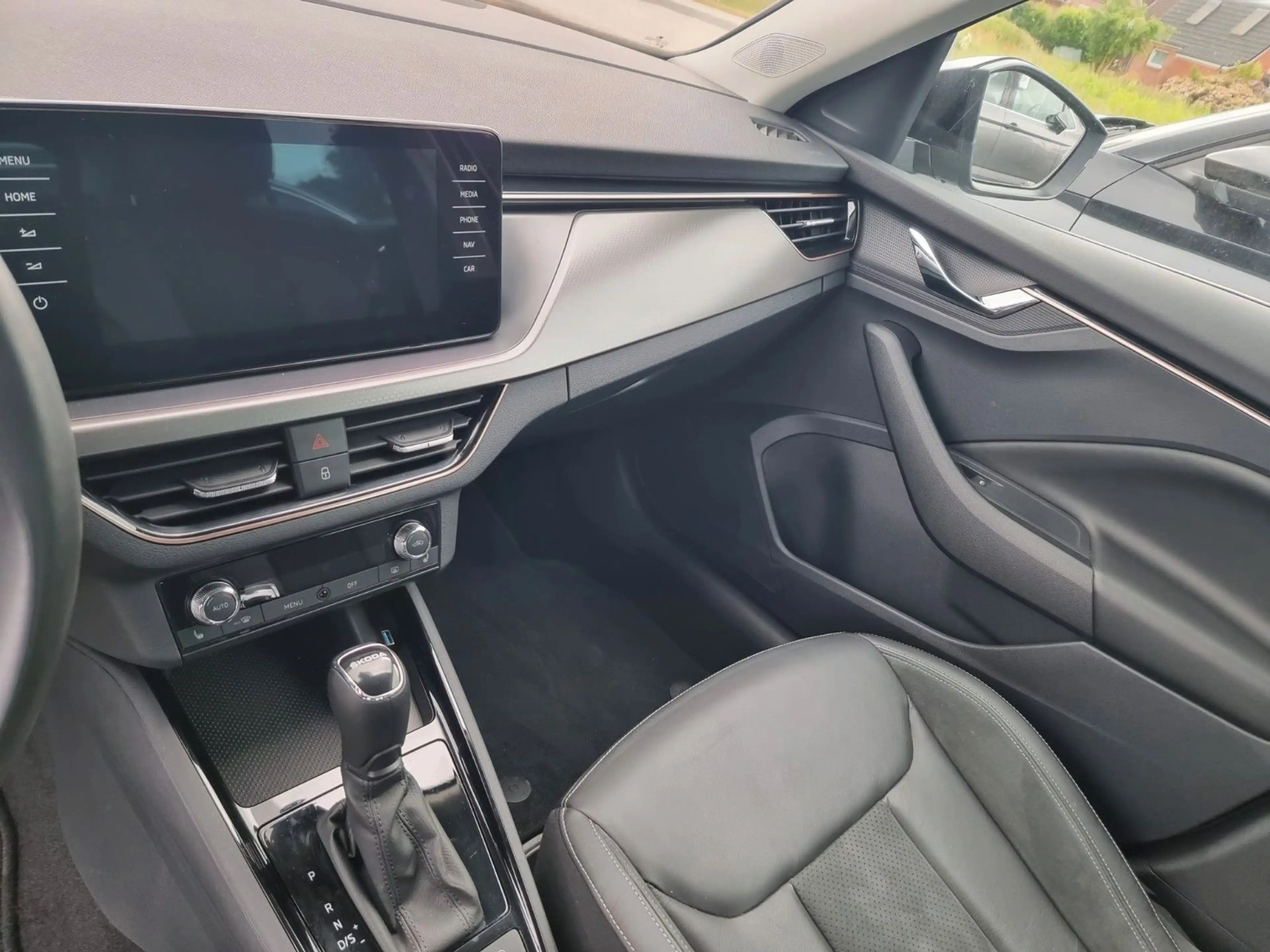 Skoda Kamiq Style CarPlay Kamera AHK Spurh. Leder — photo 11