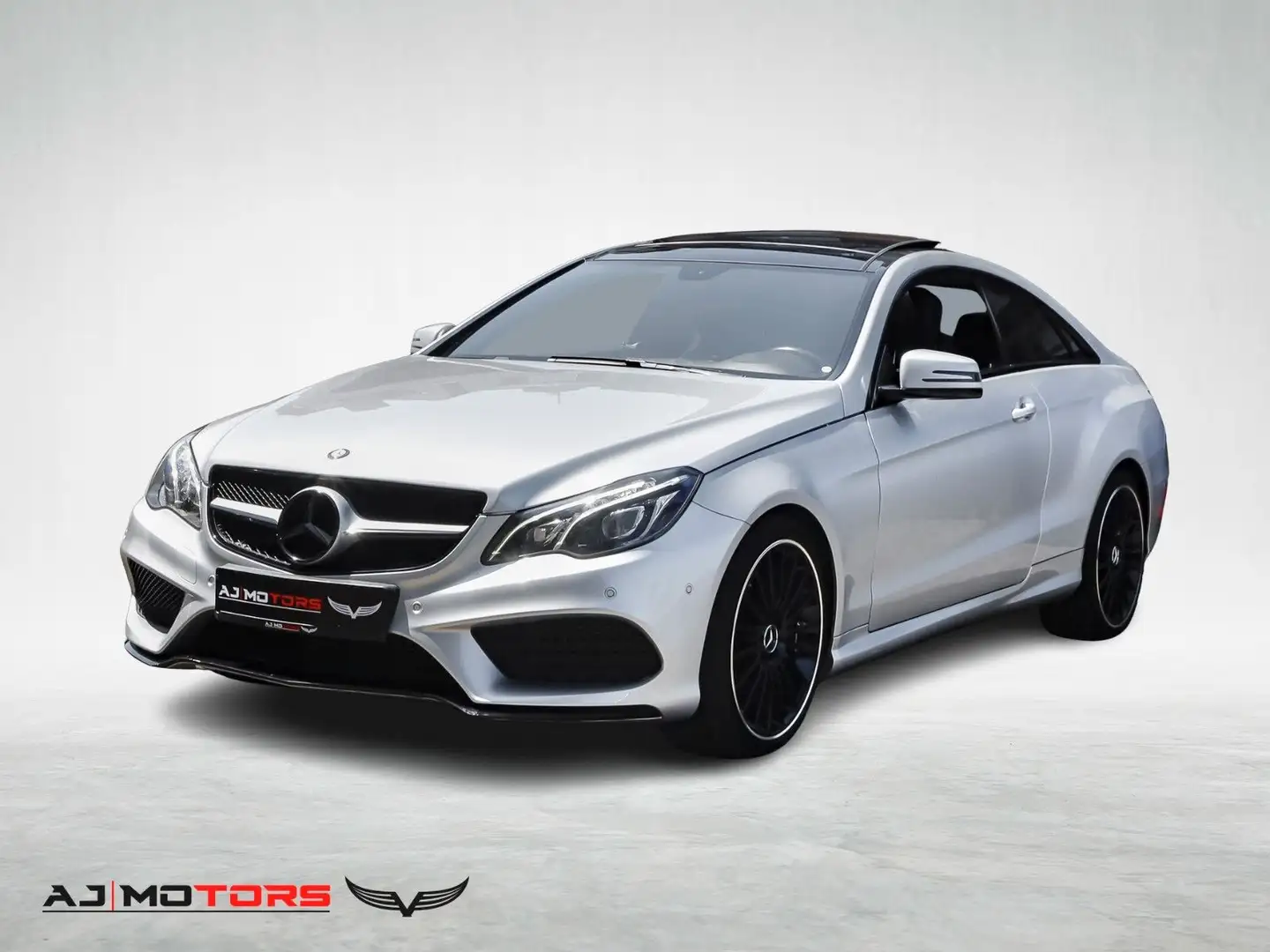 Mercedes-Benz E 220 Coupe AMG **PANO-NAVI-MEMORY-LED-SHZ** Plateado - 1