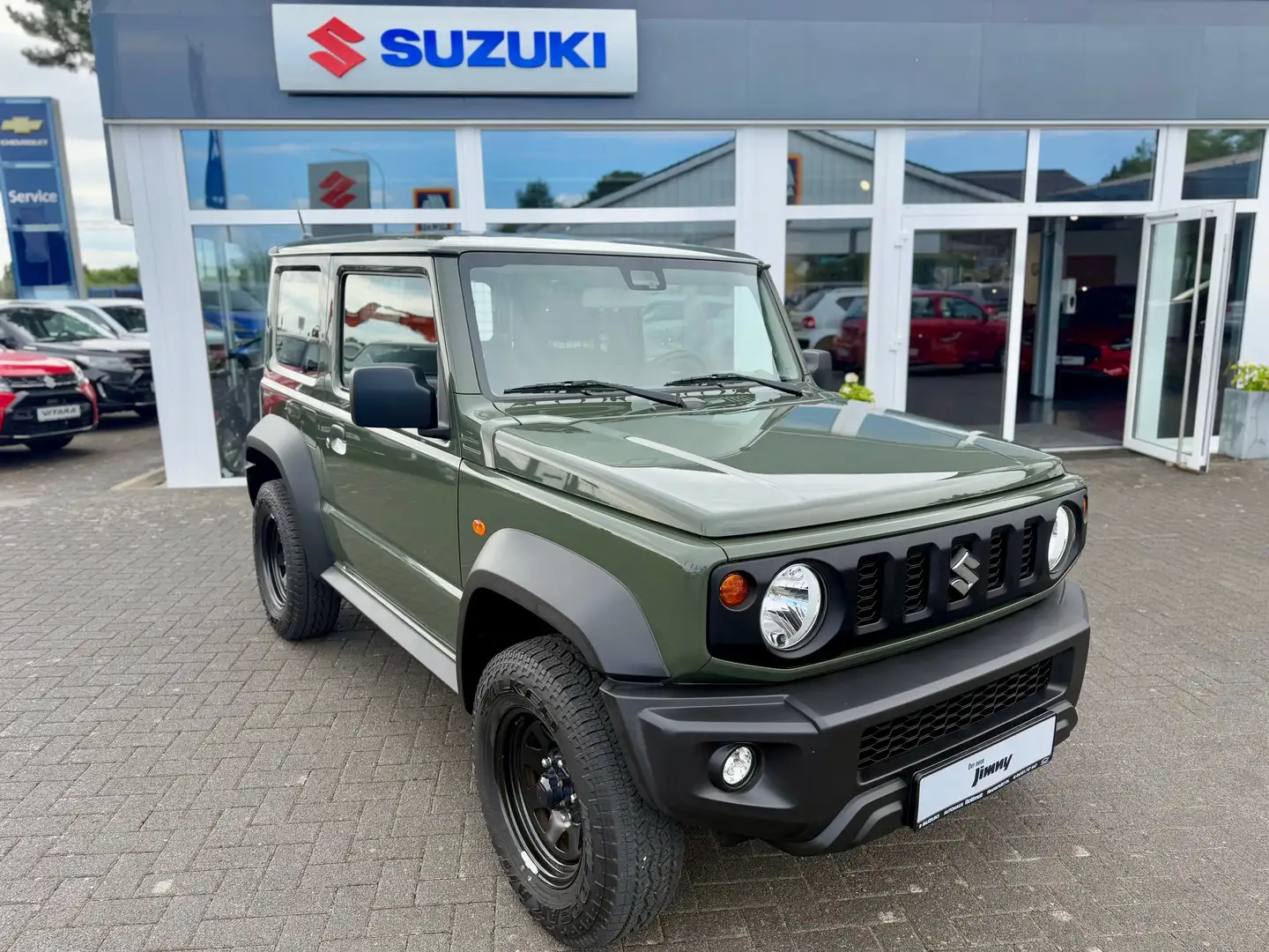 Suzuki Jimny 1.5. ALLGRIP NFZ Comfort*Grobstollenreifen* Grün - 1