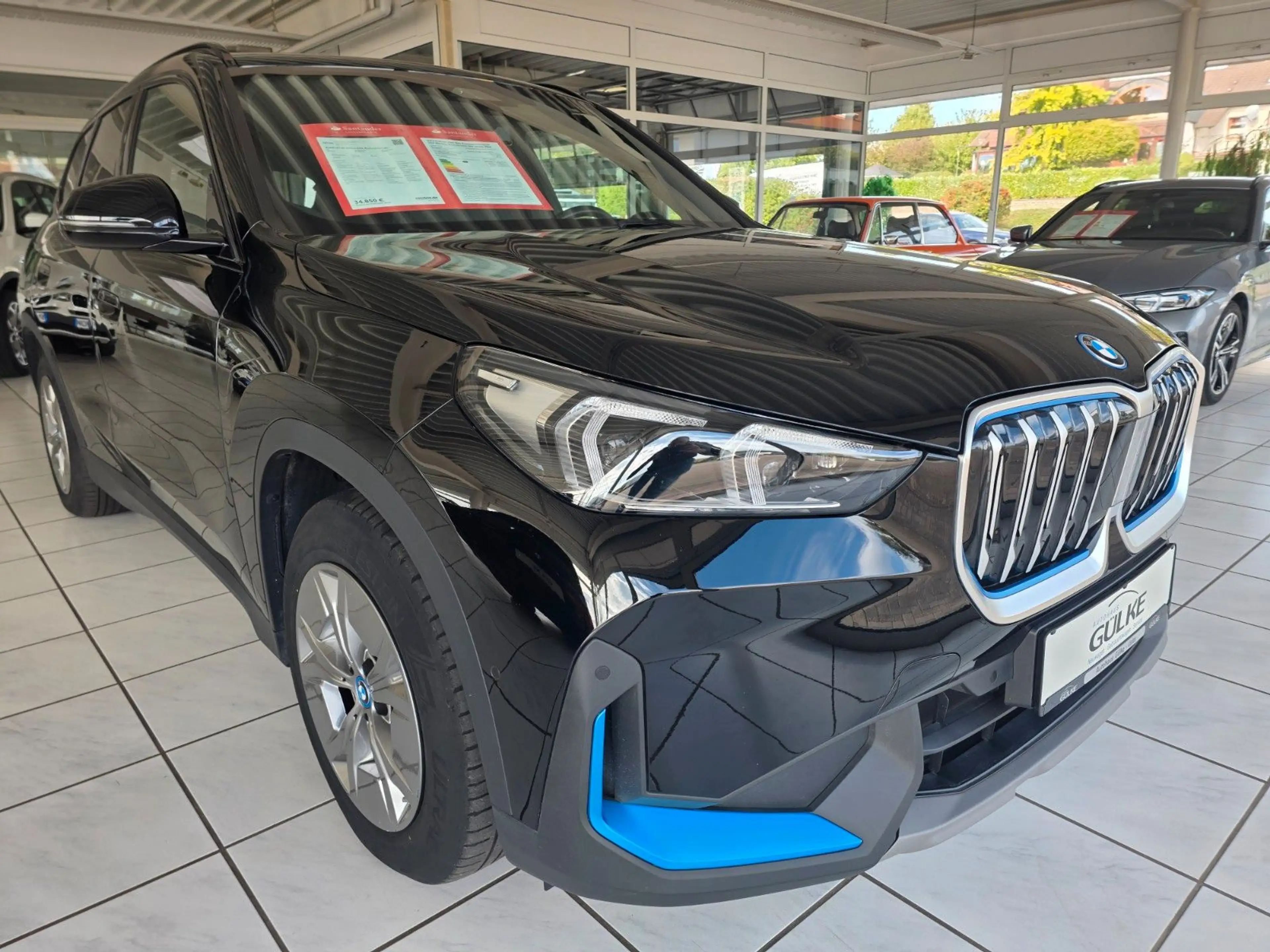 BMW iX1 30 xDrive AHK,Kam,Lenkradh. — photo 7
