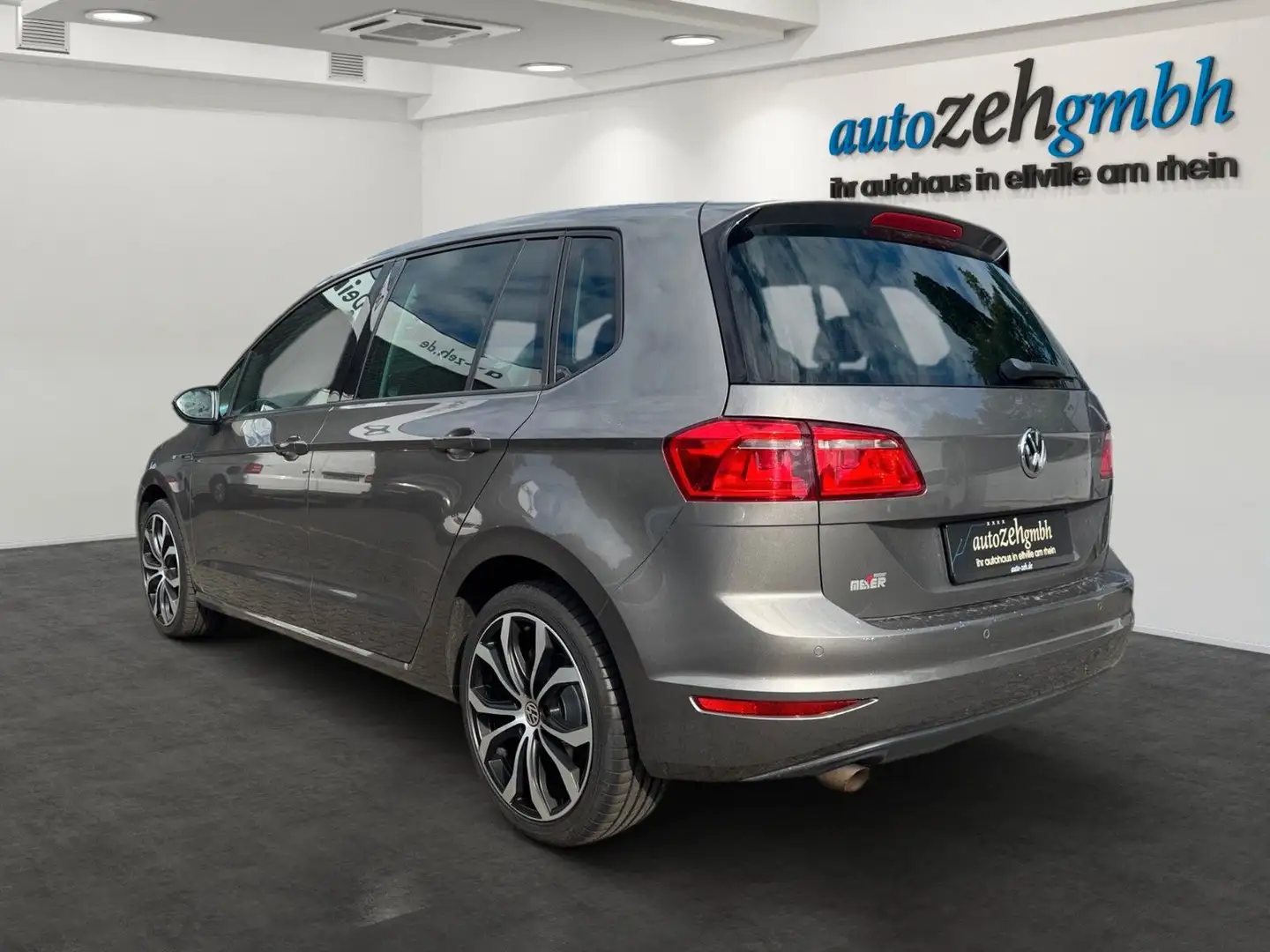 Volkswagen Golf Sportsvan 1.6 TDi +Klimatr.+Navi+PDC+Sitzh. Grijs - 2