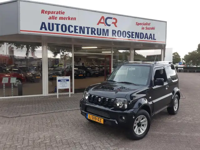 Suzuki Jimny 1.3 Exclusive LMV LEER TREKHAAK AIRCO zeer nette a