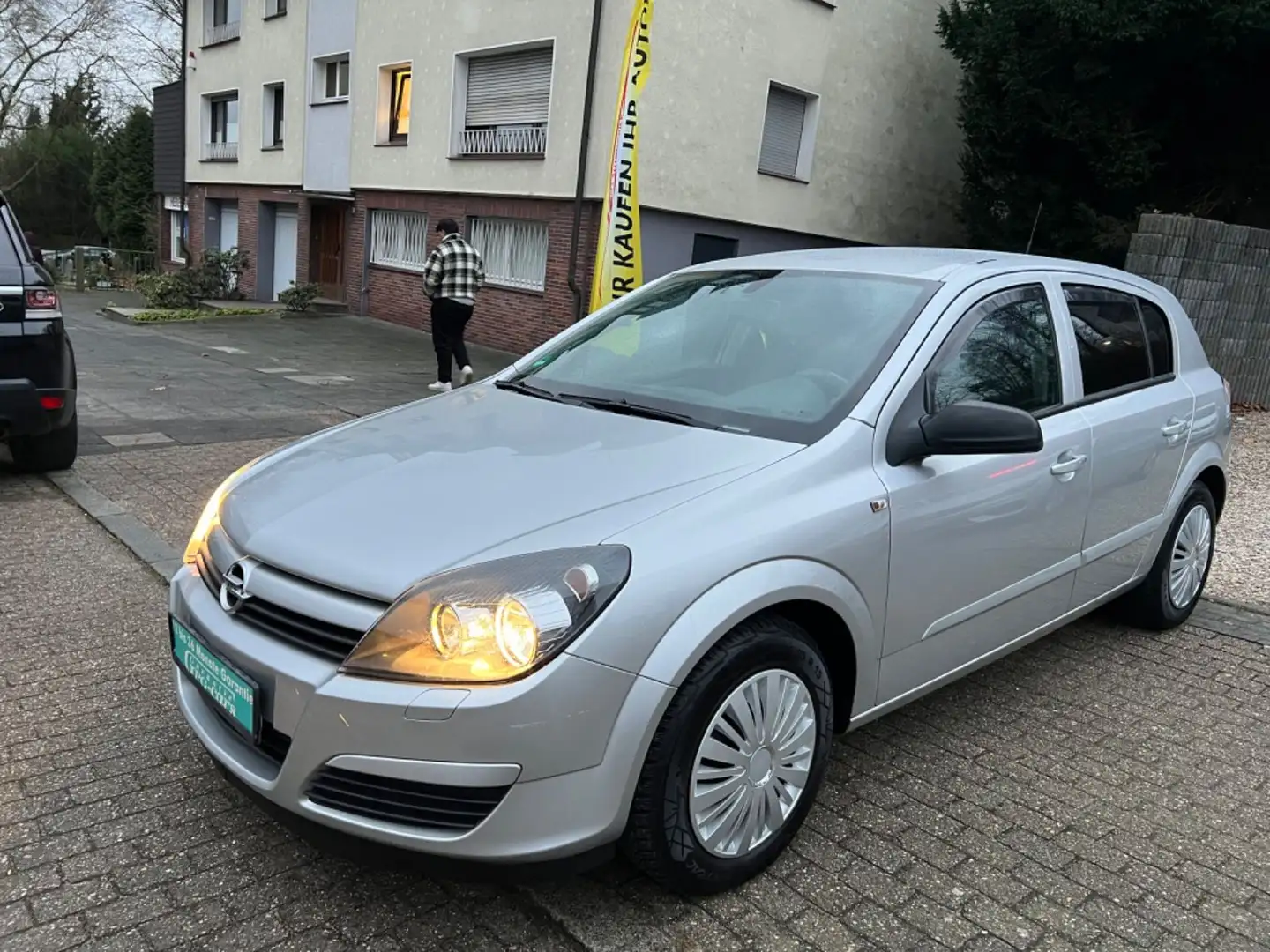 Opel Astra 1.4 Twinport Enjoy*TÜV NEU*KLIMA*TOP AUTO* Plateado - 1