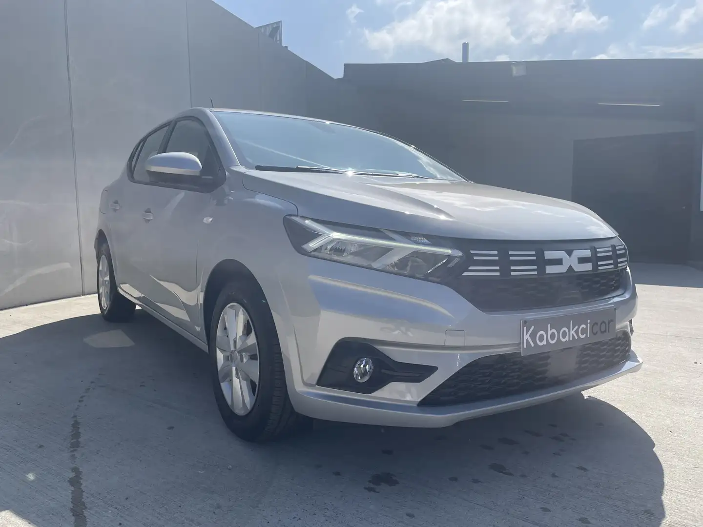 Dacia Sandero Sandero 1.0i SCe Exp/RADAR ARR/CLIMATISATION/REGU Grijs - 1