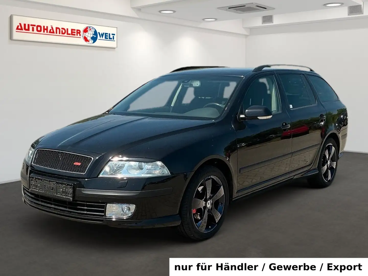 Skoda Octavia Kombi 1.6 FSI Xenon AAC AHK PDC SHZ Temp Noir - 1