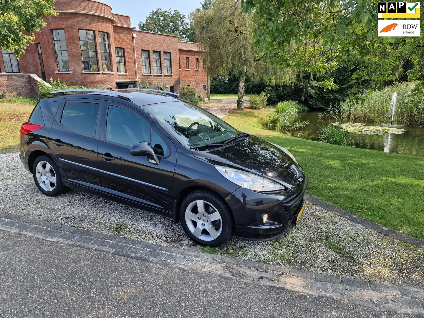 Peugeot 207 SW 1.6 VTi Allure AIRCO/cruise *apk:06-2026* Zwart - 1