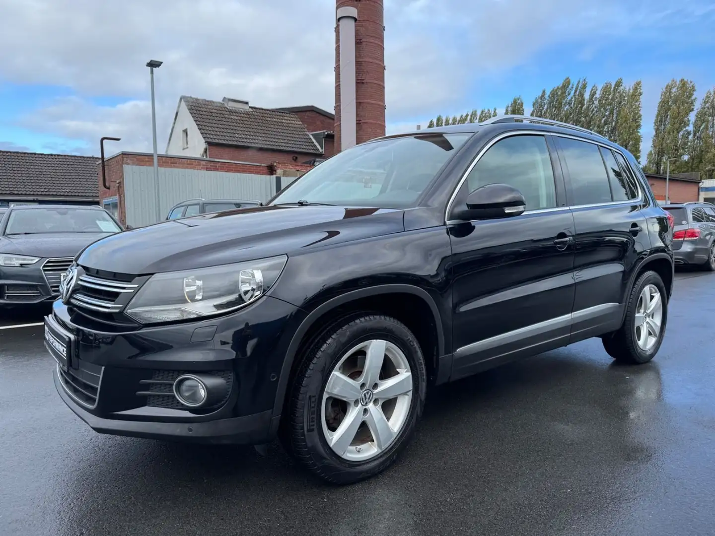 Volkswagen Tiguan Sport & Style BMT*PANO*TÜV27*NAVI*SITZH Nero - 1