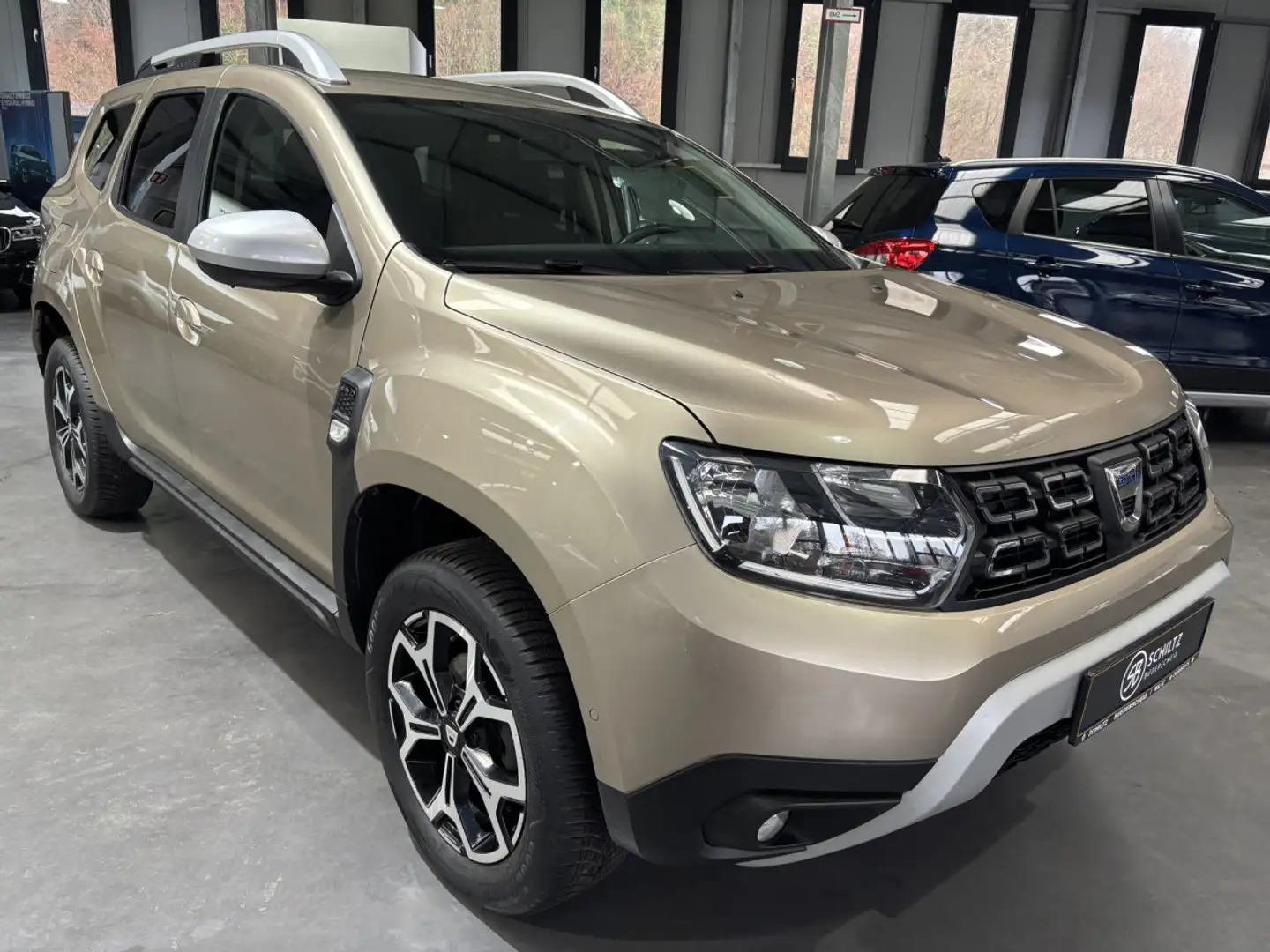 Dacia Duster 1.3 TCe PRESTIGE 4WD Beige - 1