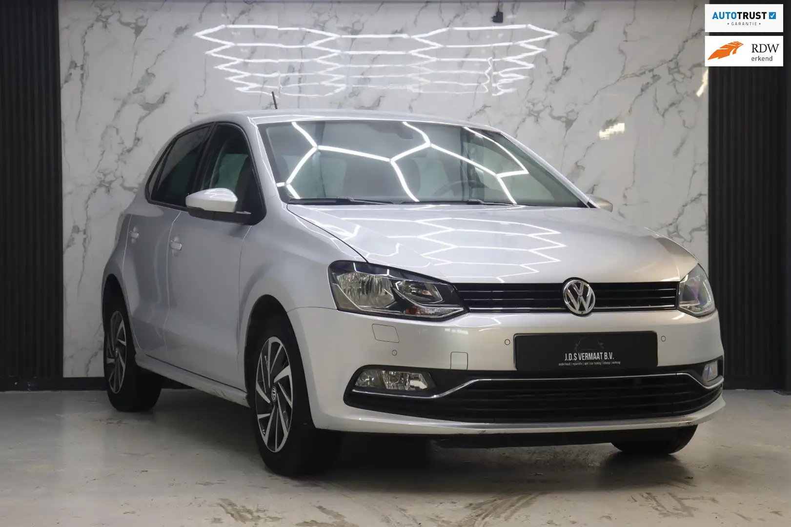 Volkswagen Polo 1.2 TSI Highline DSG Sound Ed Grijs - 1