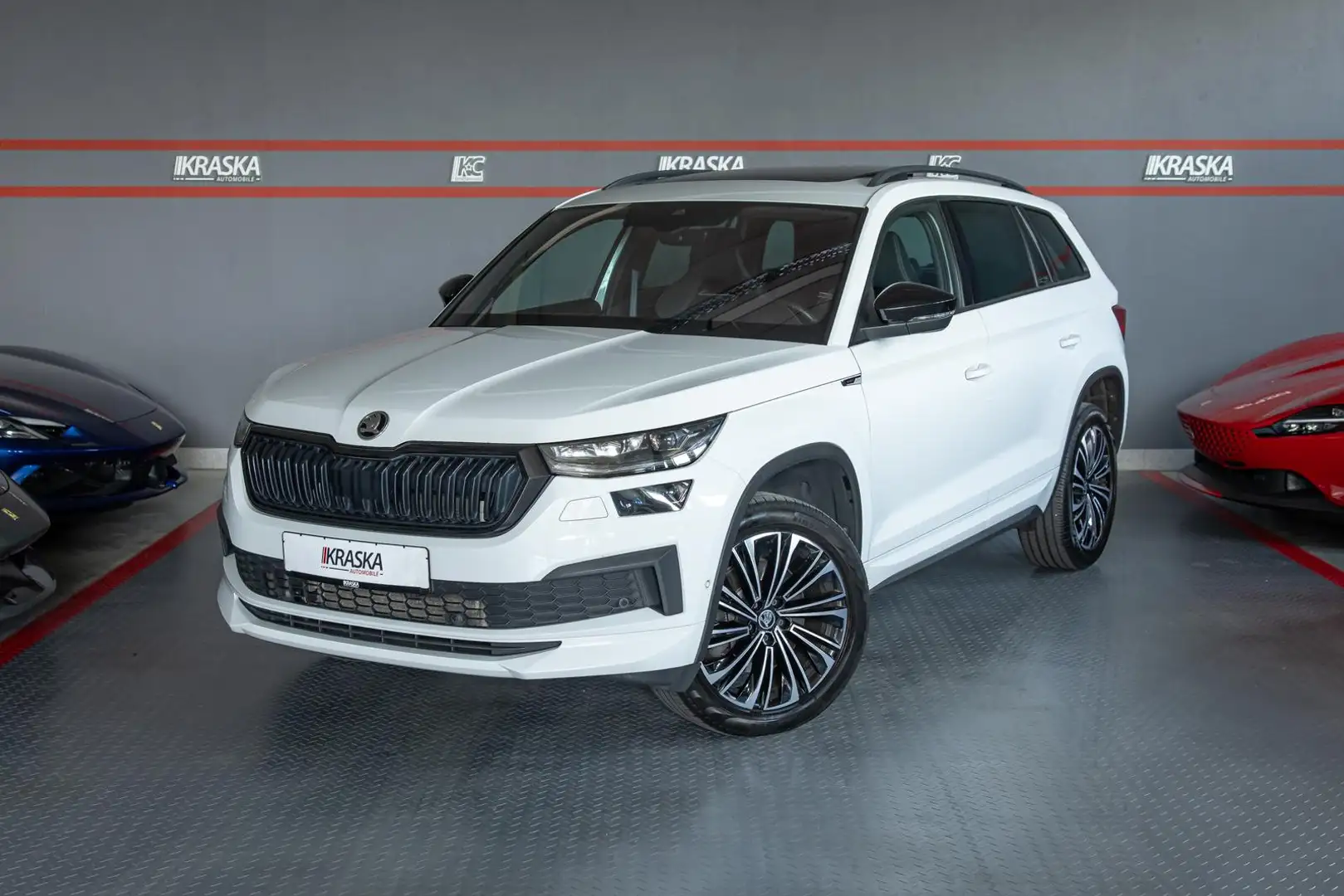 Skoda Kodiaq 2.0 TDI Sportline 4x4 PANO AHK AMUNDSEN Blanco - 1