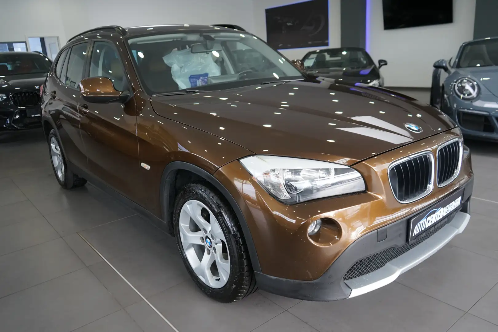 BMW X1 sDrive 20i+CAPLAY+NAVI+KAMERA+PDC Marrone - 1