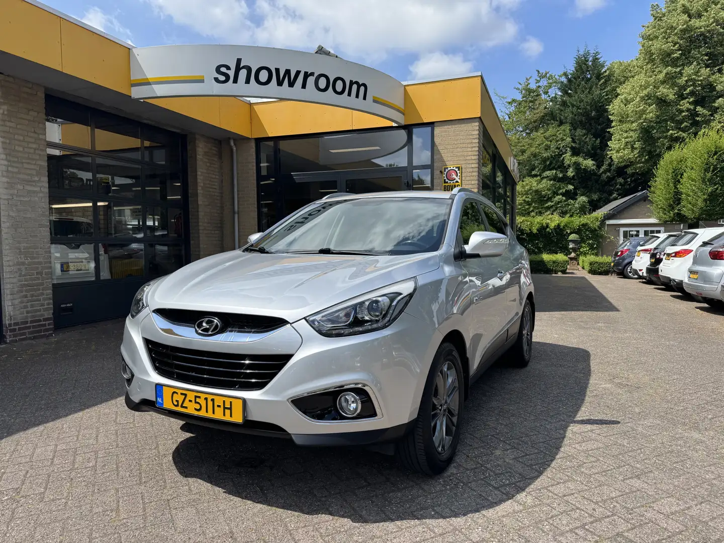 Hyundai iX35 1.6i GDI Go! Climate Control Navi Camera Grijs - 1
