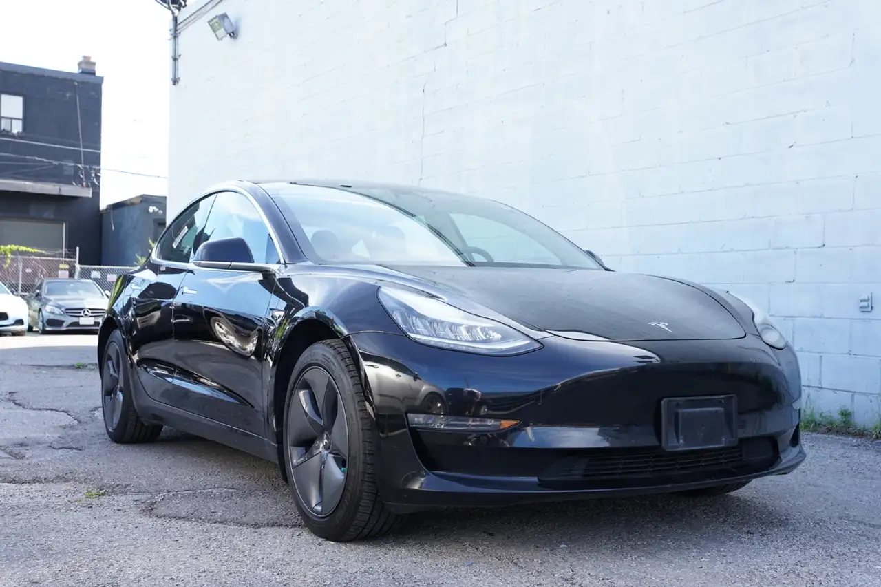Tesla Model 3 photo Tesla Model 3