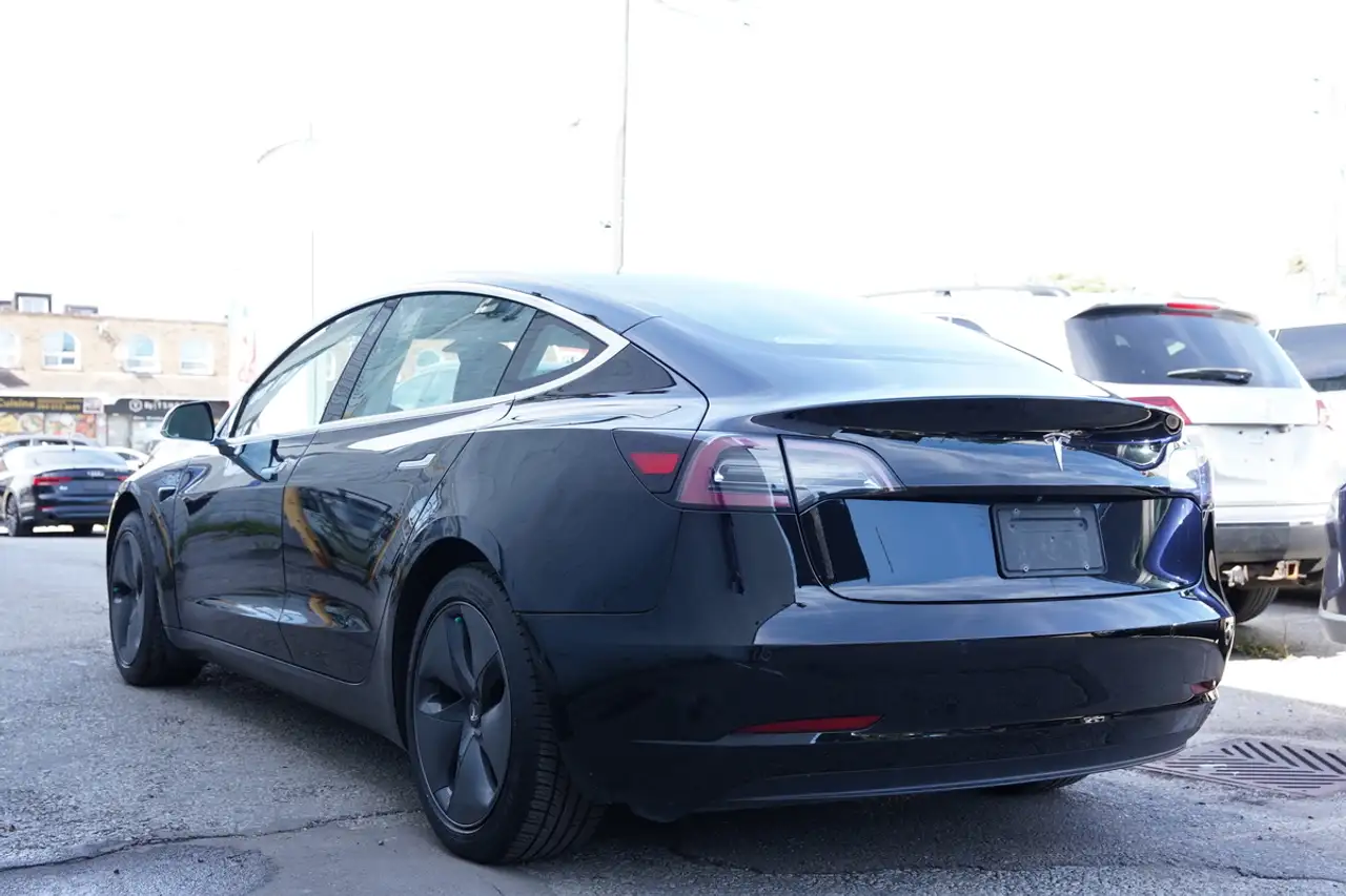 Tesla Model 3 photo Tesla Model 3