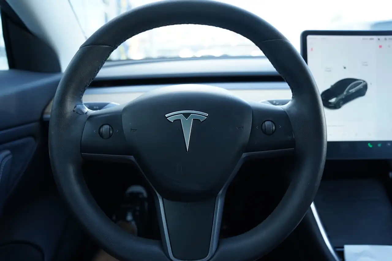 Tesla Model 3 photo Tesla Model 3