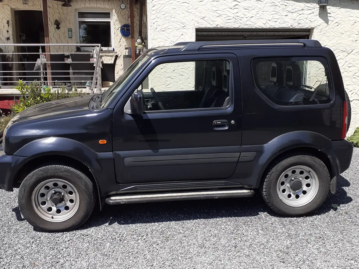 Suzuki Jimny 1.3i 16v JLX Chillout crna - 1