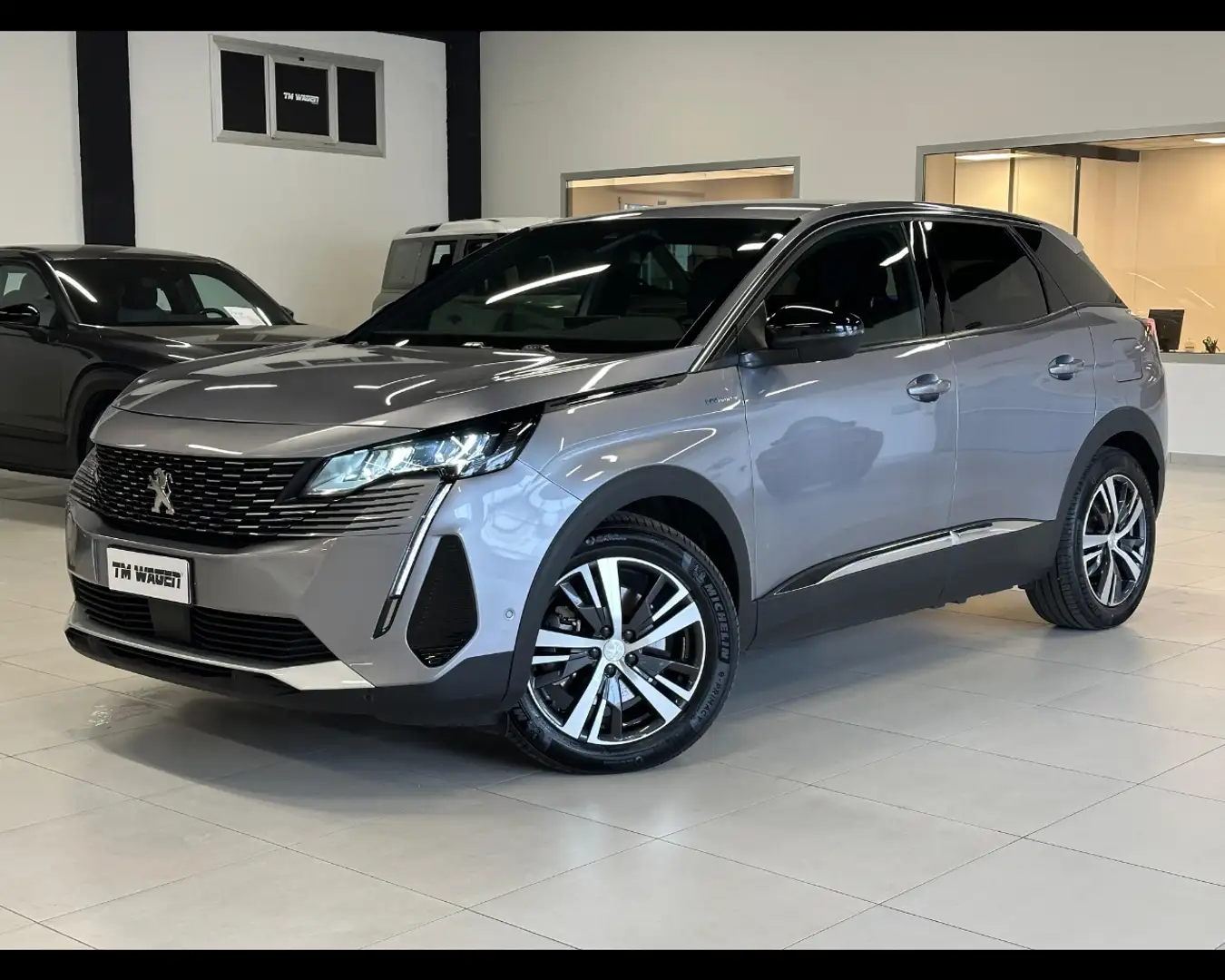 Peugeot 3008 Hybrid4 300 e-EAT8 Allure Pack Grijs - 1